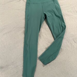 VUORI STUDIO POCKET LEGGING
Size: S